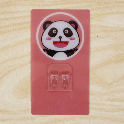 Wukusy cartoon adhesive plastic wall hook with strong hold, self-stick hanger for storage and organization on smooth surfaces.
