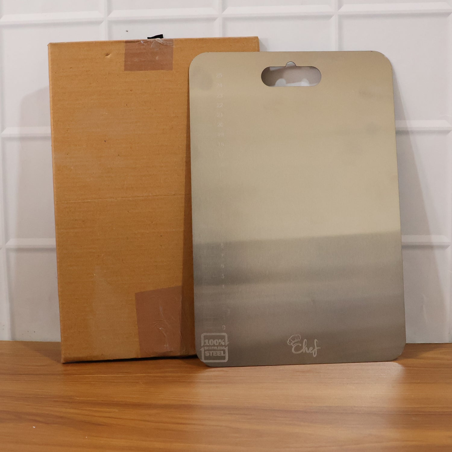 Large stainless steel Wukusy chopping and cutting board with a smooth surface, ideal for food prep and kitchen use.