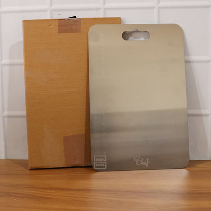 Large stainless steel Wukusy chopping and cutting board with a smooth surface, ideal for food prep and kitchen use.