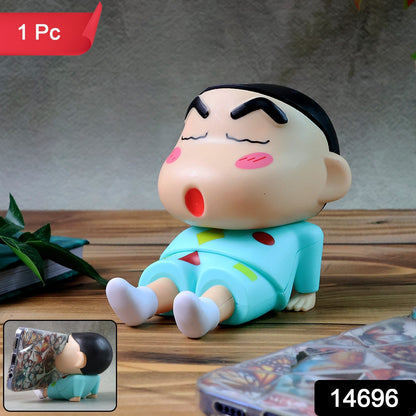 Cute cartoon figurine mobile phone stand by Wukusy, featuring a colorful, playful character design for holding smartphones.