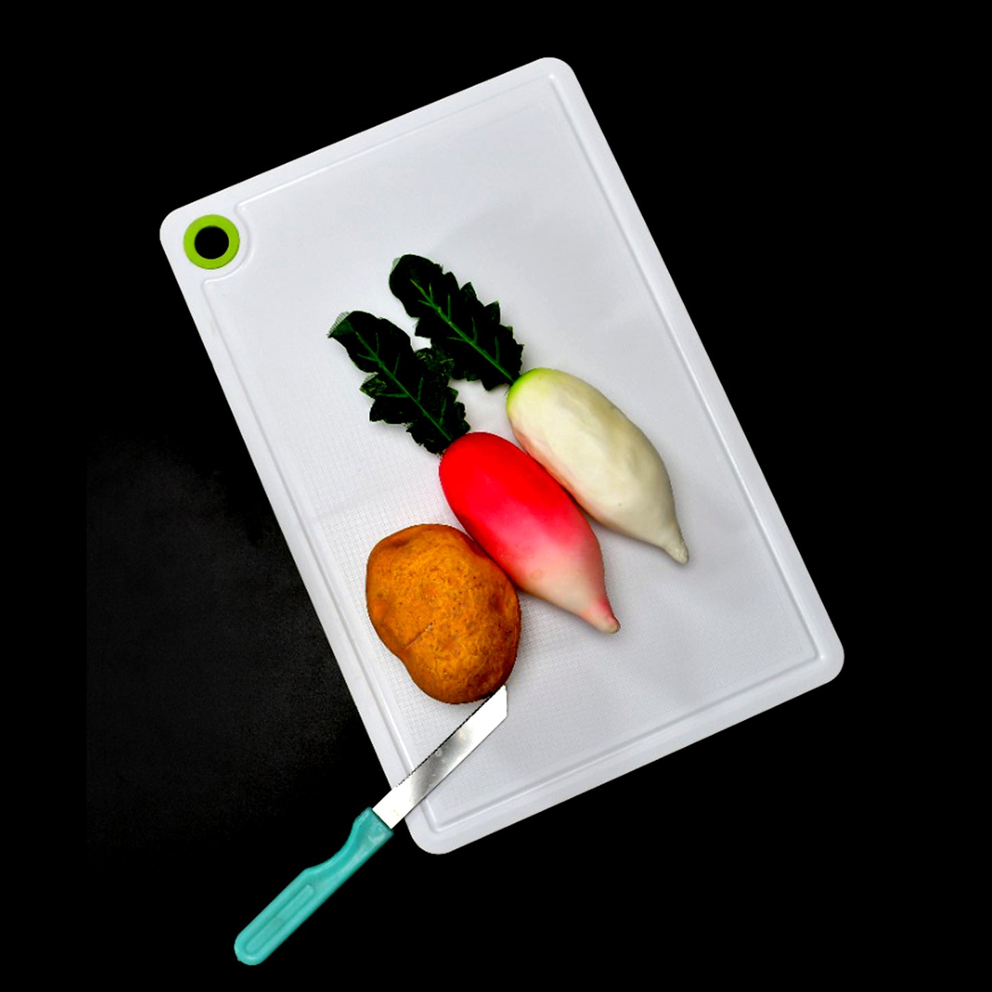 Wukusy 2316 Fruit and Vegetable Plastic Cutting Board, kitchen tool for chopping and food prep.