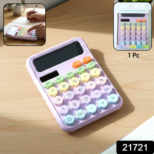 Wukusy electronic desktop calculator with numeric keypad and display screen, placed on a white desk surface.