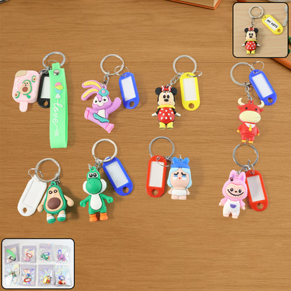 Wukusy cartoon character keychain with a name tag, featuring a colorful, playful design on a metal keyring.