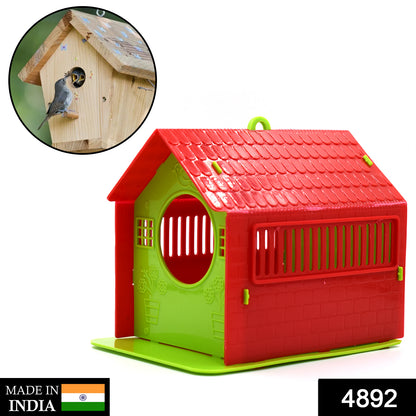 Wukusy small bird house for birds, made of wood with a circular entrance, suitable for garden or outdoor use.