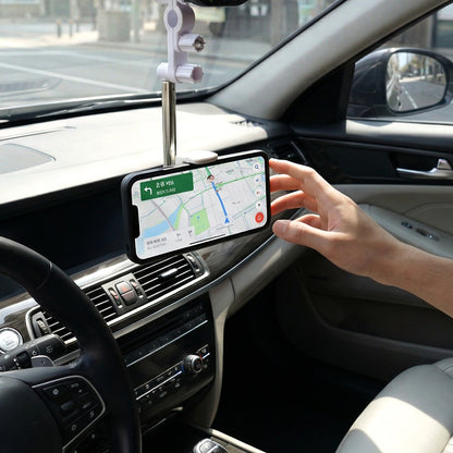 Wukusy adjustable rearview mirror car mobile phone holder attached to car mirror, holding a smartphone securely for easy access.