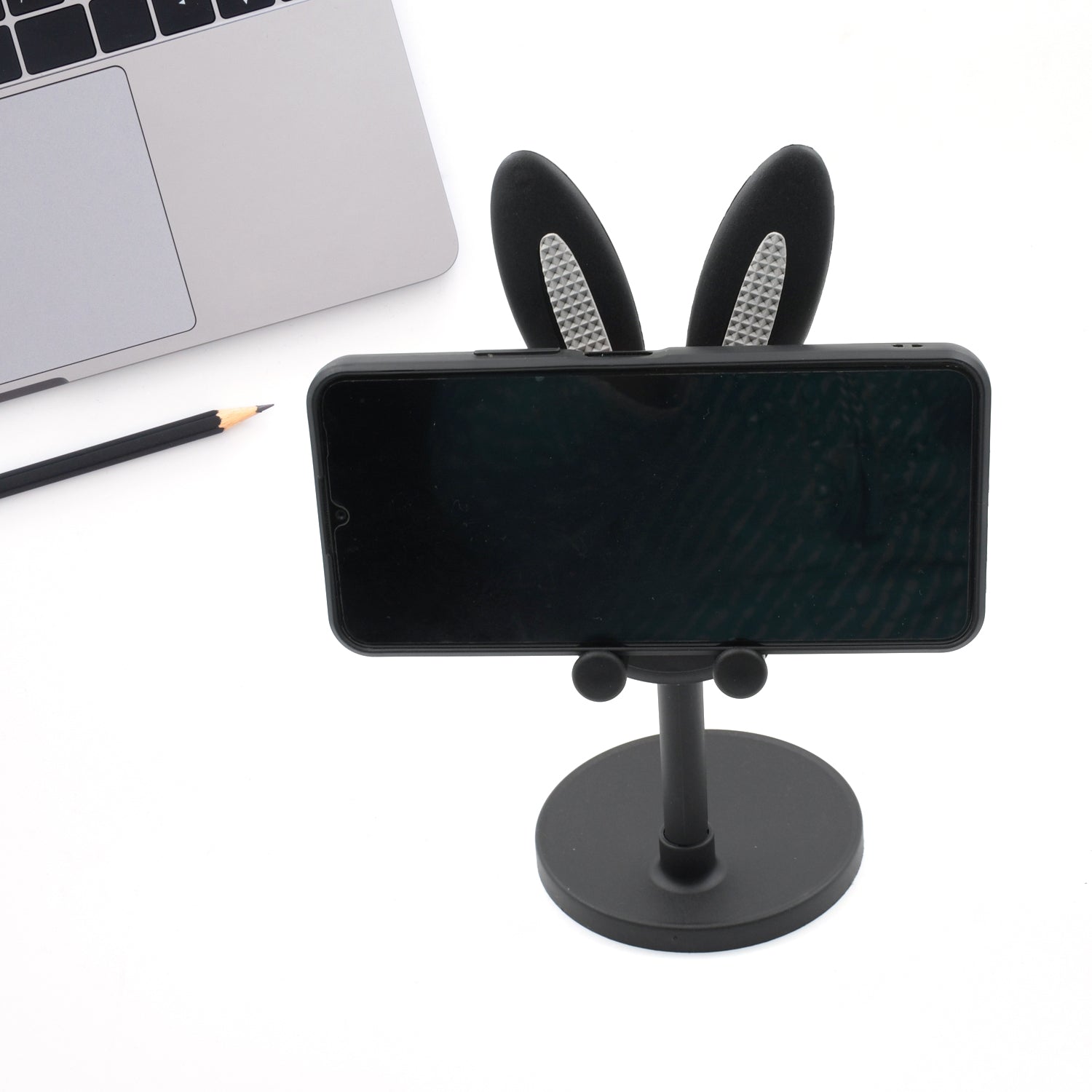 Cute Wukusy bunny-shaped phone stand with adjustable angle for desk use, featuring a kawaii design perfect for Easter gifts and accessories.