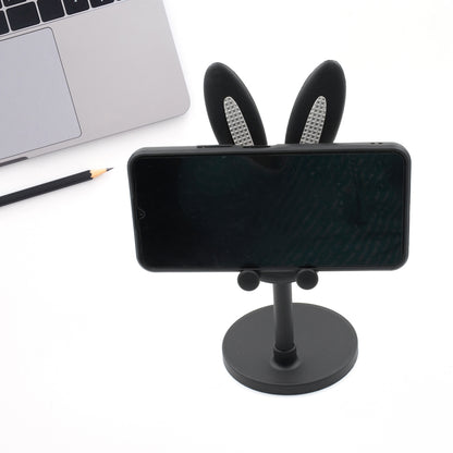 Cute Wukusy bunny-shaped phone stand with adjustable angle for desk use, featuring a kawaii design perfect for Easter gifts and accessories.