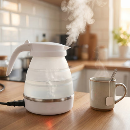 Wukusy collapsible travel electric kettle, 600ml foldable silicone water boiler, compact and portable for travel use.