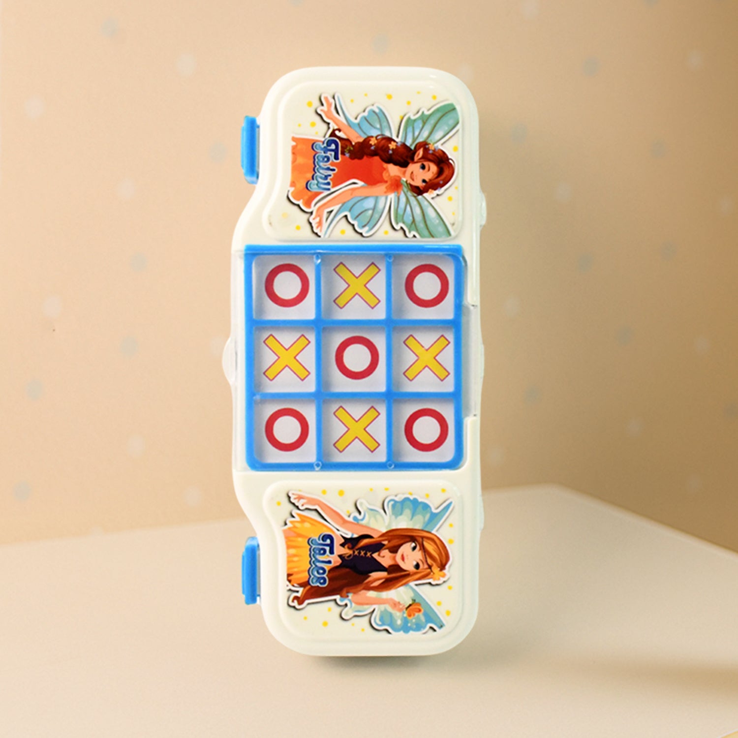 Kids pencil box by Wukusy with an integrated Tic Tac Toe game, featuring a colorful plastic design and compact storage space.