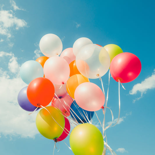 Set of 24 multicolor latex balloons from Wukusy, ideal for birthday, anniversary, wedding, or party decorations.
