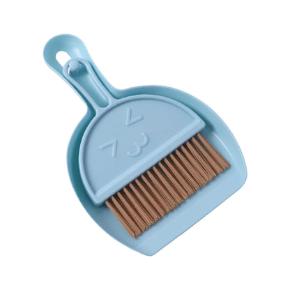 Wukusy 2-in-1 mini cleaning dustpan and hand brush set for quick kitchen and home mess cleanup.