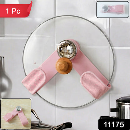 Wukusy adjustable anti-slip pot lid holder clip securing a pot lid on a stovetop, made of durable plastic with a non-slip grip