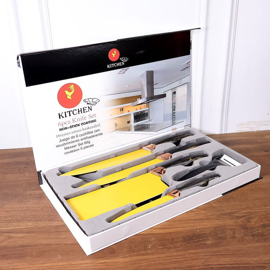 Six-piece Wukusy professional kitchen knife set including chef knives, cleaver, peeler, and scissors on a countertop.