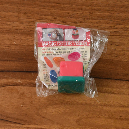 Wukusy Magic Colour Vision Dice Trick Toy set featuring vibrant, color-changing dice for entertaining magic tricks and illusions.