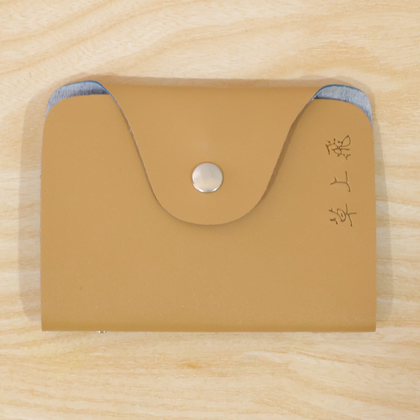 Wukusy premium leather card holder wallet with button closure and 10 inner leaf pages, compact and stylish for everyday use