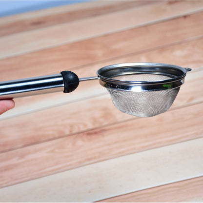 Wukusy stainless steel soup and tea strainer kitchen tool with fine mesh for filtering liquids and solids.