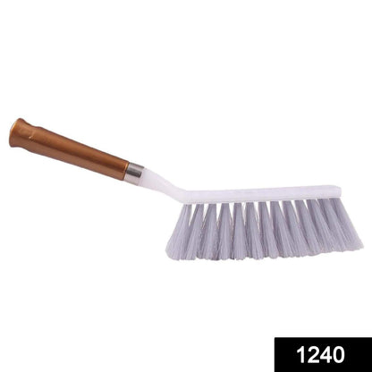 Wukusy 1240 plastic household cleaning brush with ergonomic handle for scrubbing and cleaning surfaces in home improvement tasks.