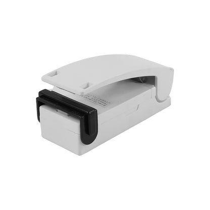 Wukusy portable mini heat sealer machine sealing plastic bags, compact home and kitchen tool for airtight storage.