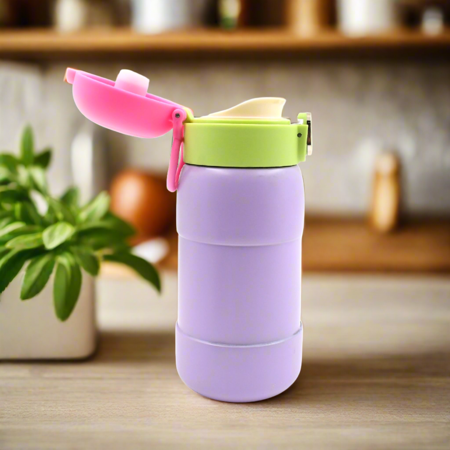 Wukusy stainless steel water bottle with spill-proof cap, BPA-free, for kids and adults, featuring a colorful mix design.