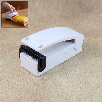 Wukusy portable mini heat sealer machine for plastic bags, compact and easy to use for home and kitchen sealing tasks.