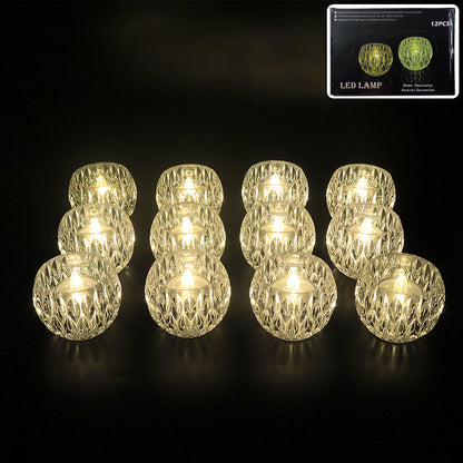 Set of 12 Wukusy crystal-style LED decorative candle lamps for home decor, featuring elegant glass-like design and warm lighting.