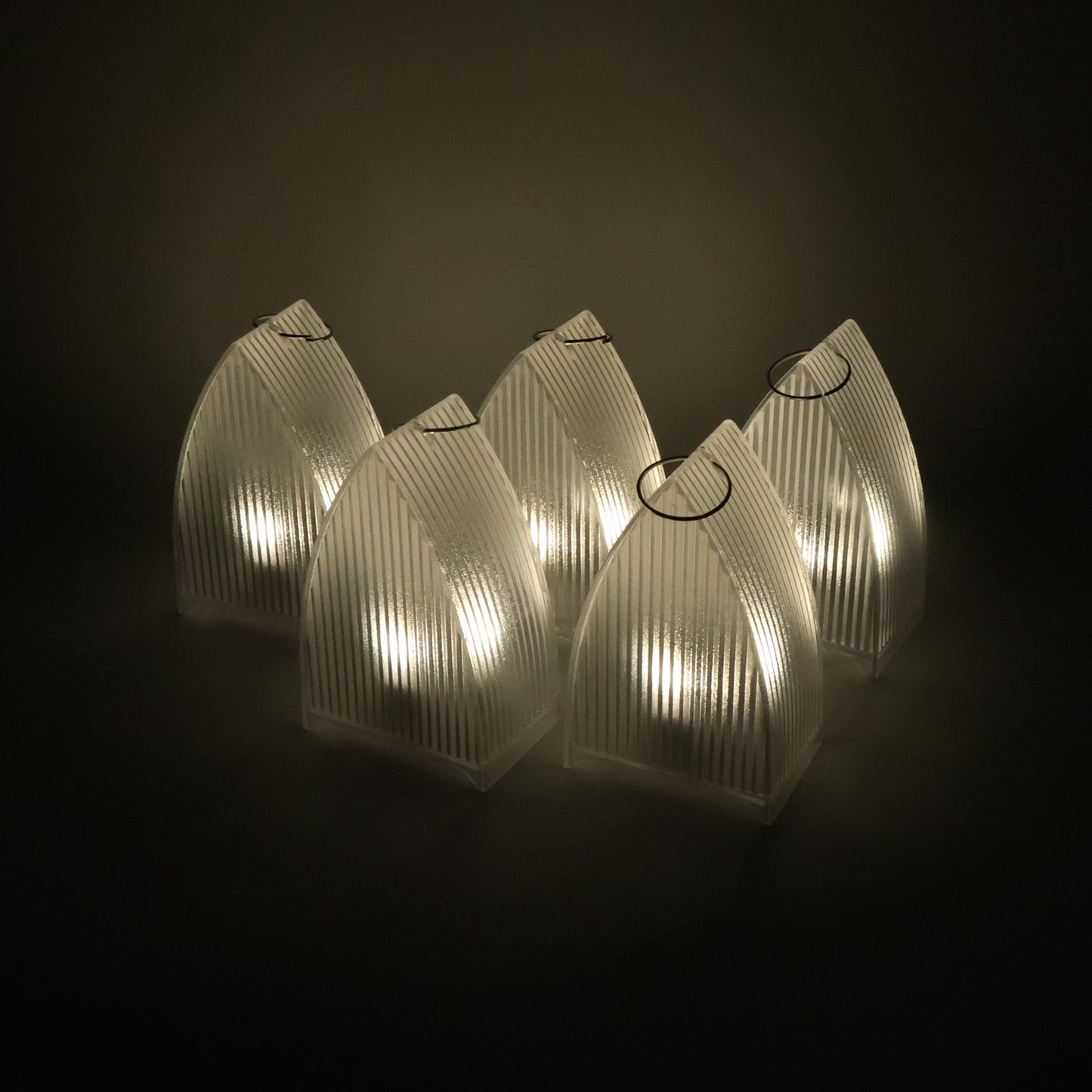 Set of five Wukusy LED flameless decorative lantern lights for home decor, featuring warm, flickering LED illumination.