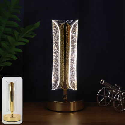 Luxury tall cylindrical crystal table lamp by Wukusy with a sleek design and transparent crystal base on a neutral surface.