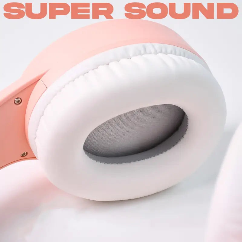 Ekom wireless over-ear Bluetooth headphones with cushioned earmuffs, foldable design, built-in mic, compact size, and cable management clips.