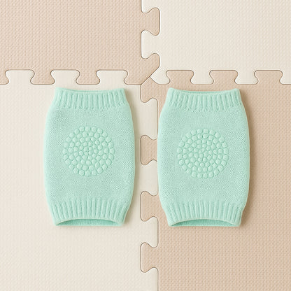 Mint green toddler wool knit leg warmer with knee guard by Wukusy, designed for baby care and warmth.