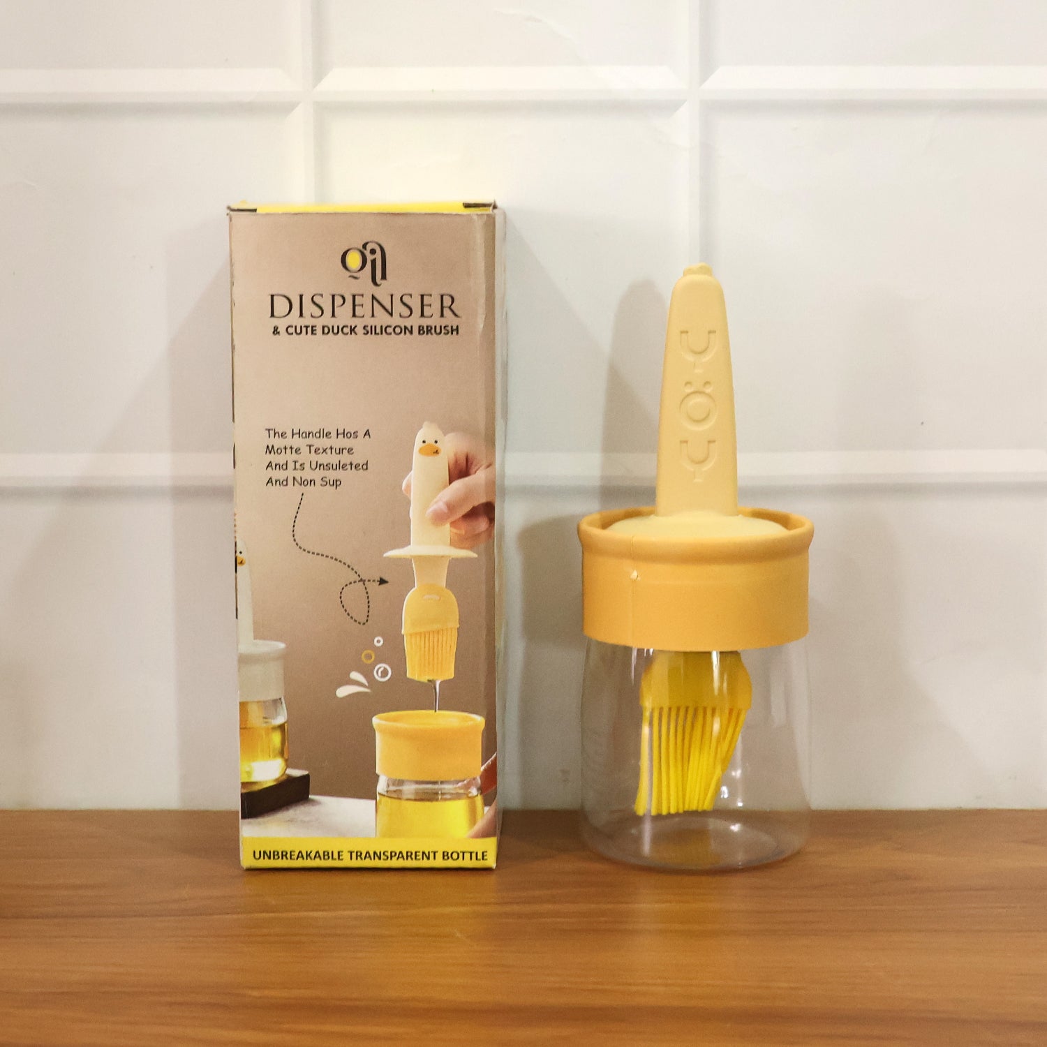 Wukusy 2-in-1 oil dispenser bottle with clear container and spout for easy oil pouring and storage.