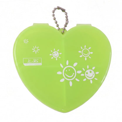 Wukusy heart-shaped plastic pill organizer box with four compartments and keychain, ideal for storing daily medication or vitamins.