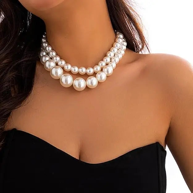 Two-layer artificial pearl mala with matching earrings from the imitation jewelry set, featuring elegant design and craftsmanship.
