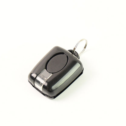 Wukusy mini LED torch keychain with attached keyring, compact portable flashlight for everyday use.