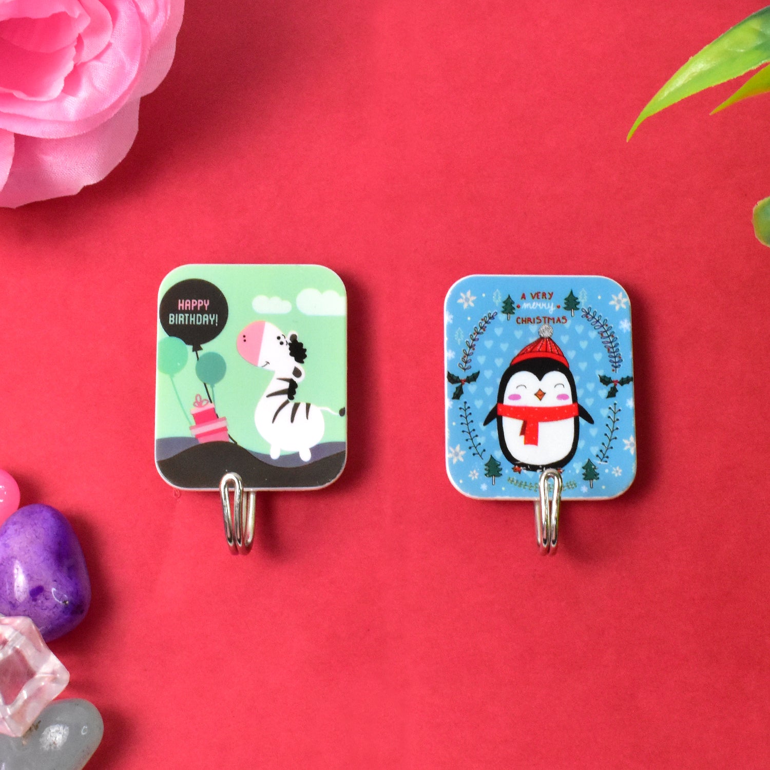 Set of two Wukusy multipurpose cartoon self-adhesive hooks for home and kitchen use, featuring colorful cartoon designs.