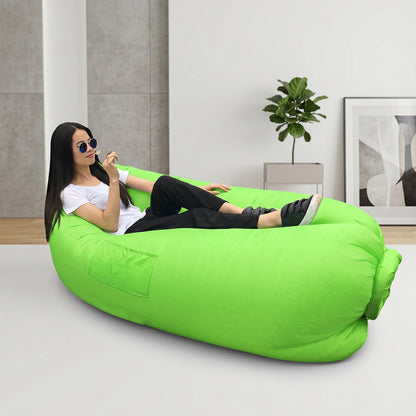 Wukusy inflatable lounger air sofa in bright green, lightweight and portable for outdoor relaxation and lounging.
