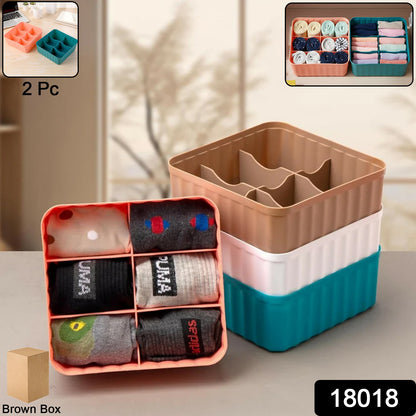 Set of two Wukusy square organizer boxes with six compartments, ideal for home storage and organization.