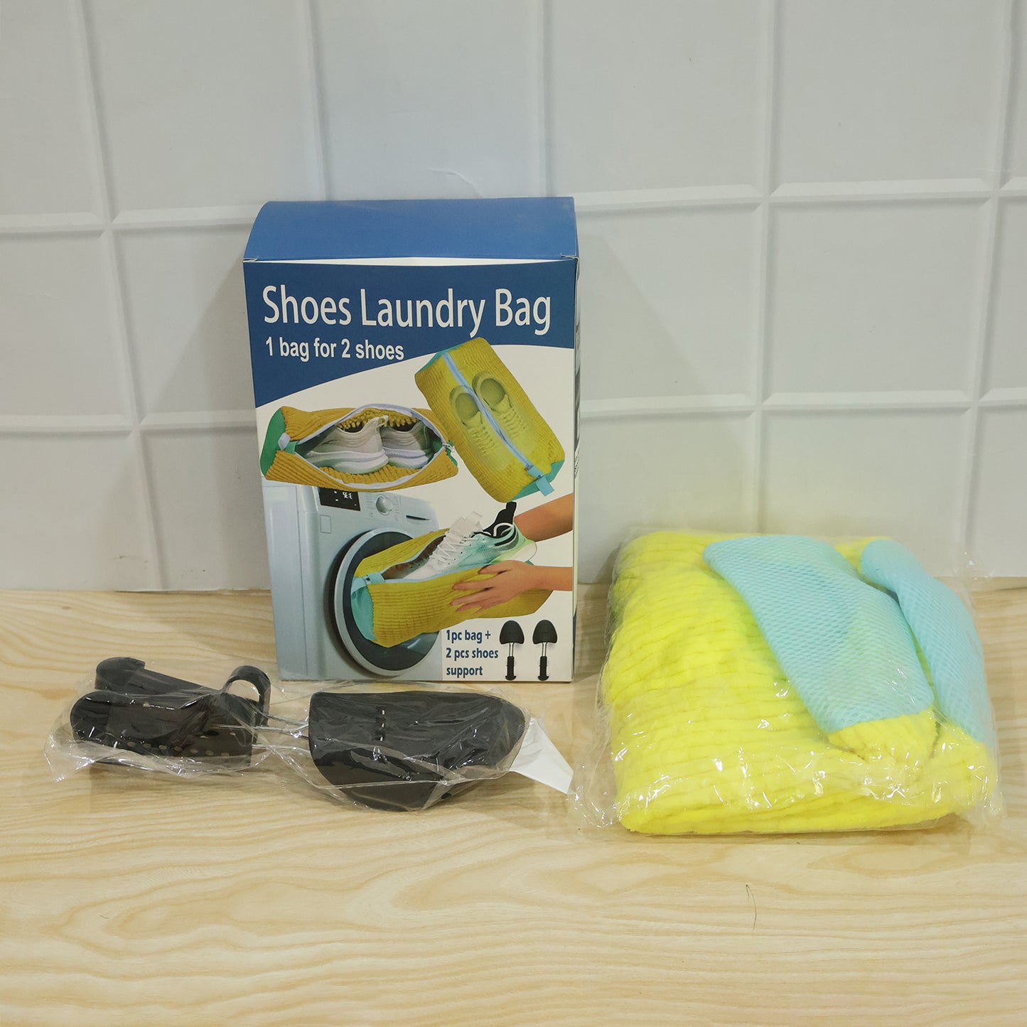 Wukusy shoe laundry wash bag with two shoe supports, designed for washing shoes in a washing machine, shown with shoes inside.