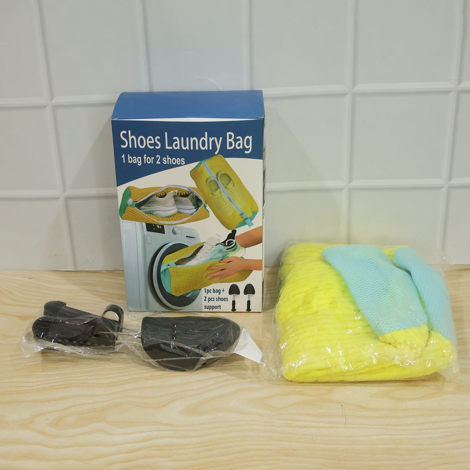 Wukusy shoe laundry wash bag with two shoe supports, designed for washing shoes in a washing machine, shown with shoes inside.