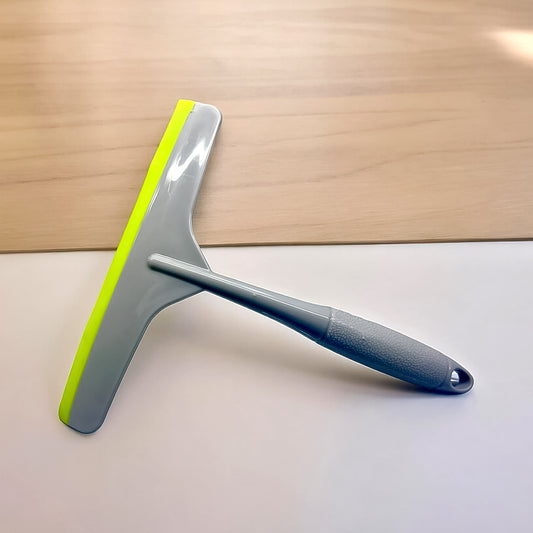 Grey plastic kitchen wiper by Wukusy, a versatile kitchen tool for cleaning and wiping surfaces.