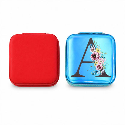 Mini jewelry organizer box with mirror by Wukusy, featuring compartments for rings and earrings, shown open with jewelry inside.