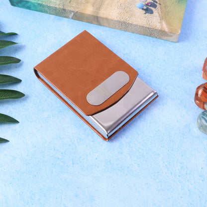 Wukusy premium leather finish visiting card holder showing sleek, brown leather with a compact design and secure snap closure.