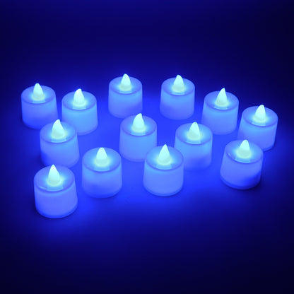 Set of 24 blue LED tea light candles by Wukusy, showing small flickering flameless candles in a dark setting