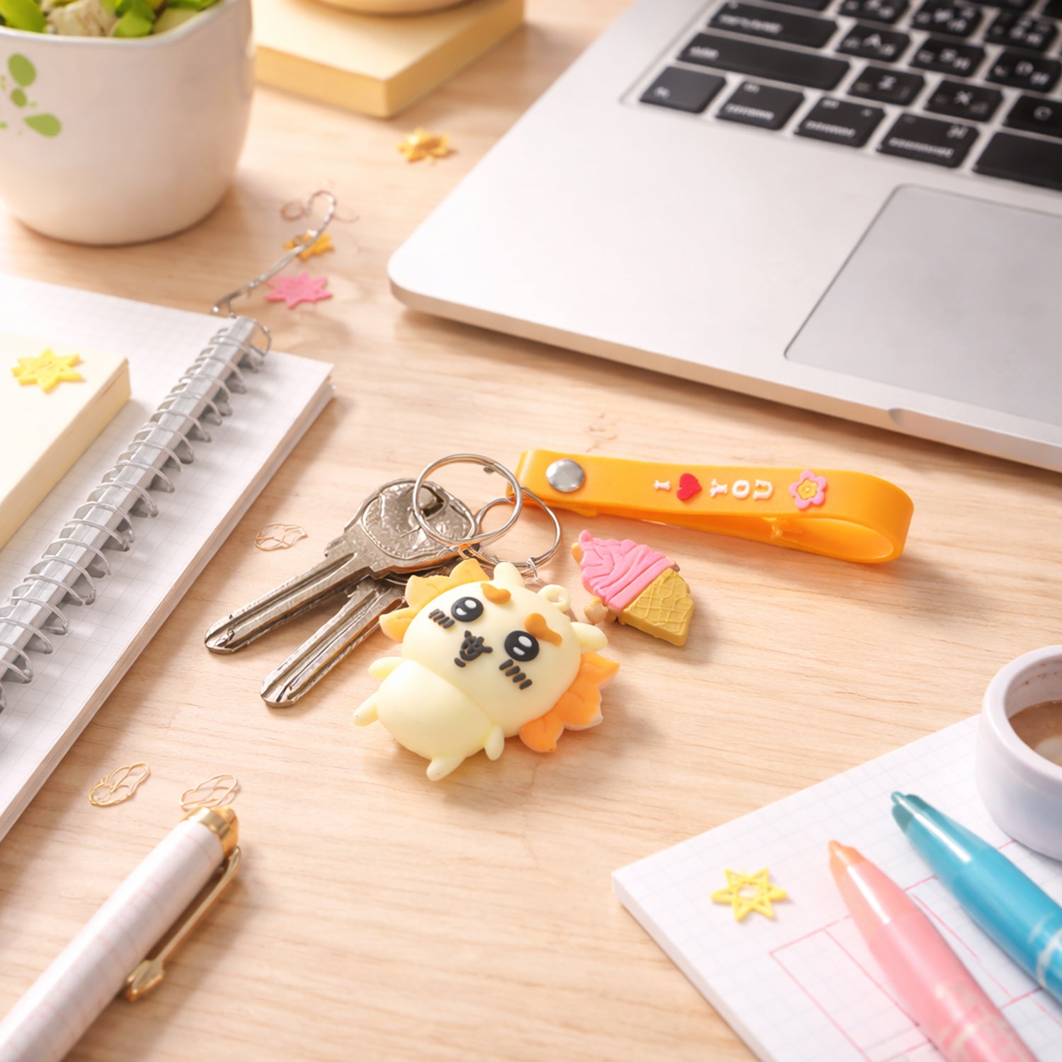 Cute cartoon animal ice cream strap keychain by Wukusy featuring a colorful animal design on a small plastic charm.