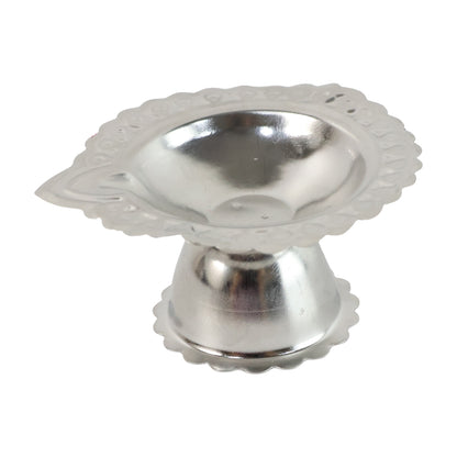 Stainless steel traditional Puja diya stand with multiple holders for oil lamps, designed for religious ceremonies and prayer offerings.
