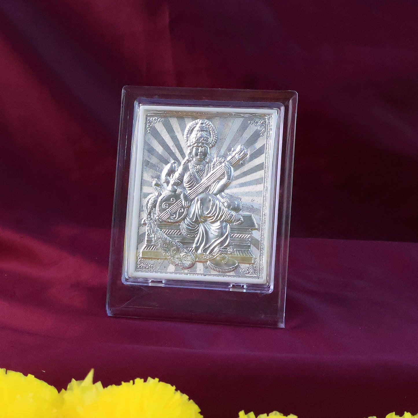 Elegant silver Saraswati Maa photo frame with stand, decorative home decor piece by Wukusy featuring intricate design details.