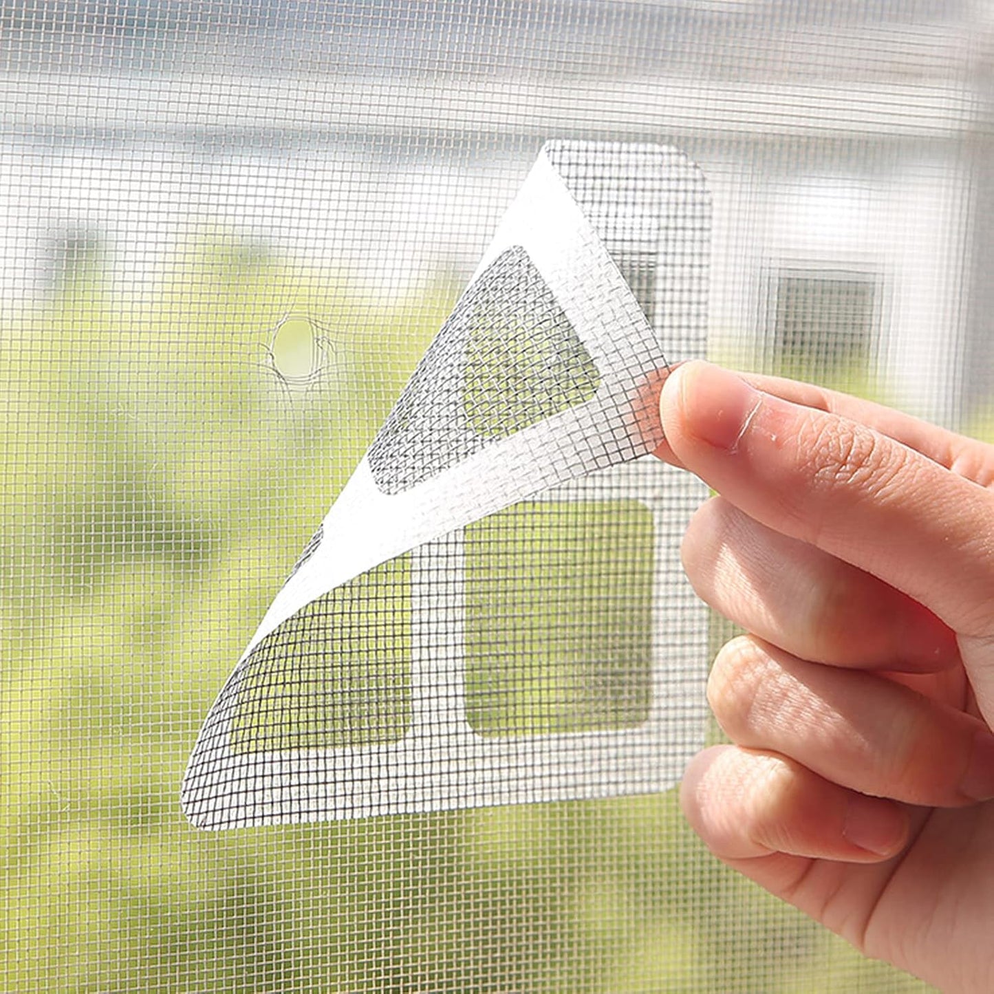 Wukusy window screen repair tape, 4-inch wide, in a roll for home improvement, used for repairing torn or damaged window screens.