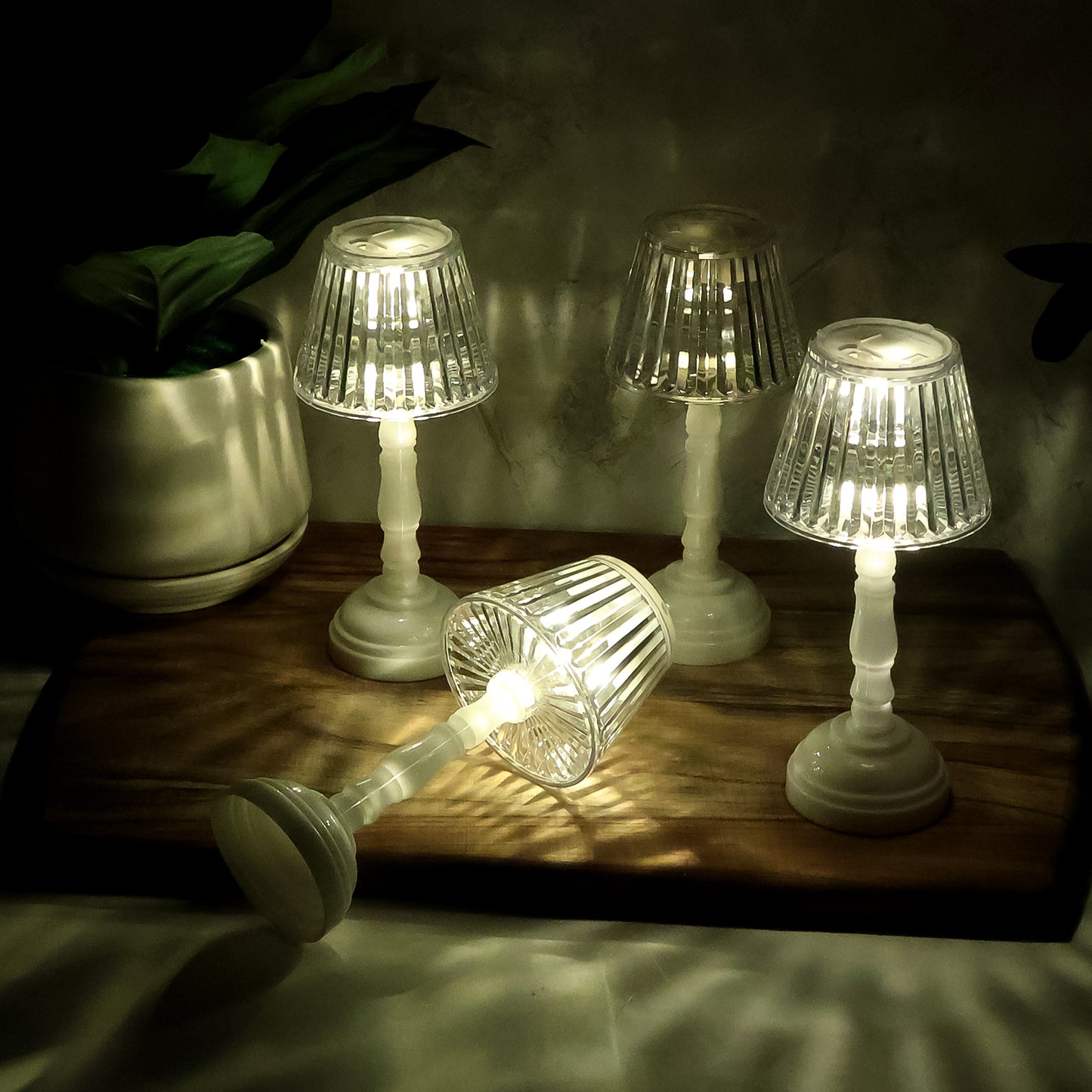 Set of four Wukusy LED crystal table lamps for home decor, featuring elegant crystal designs and soft lighting.