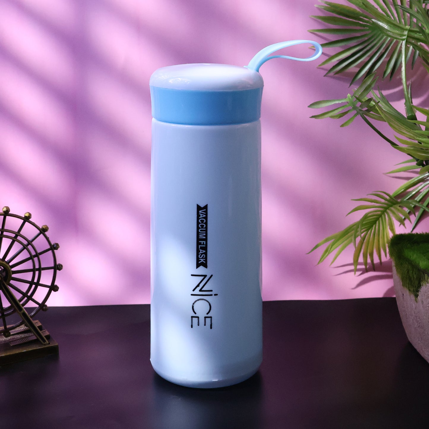 Wukusy kitchen storage water bottle for home improvement, clear plastic container with screw-top lid on a kitchen countertop.