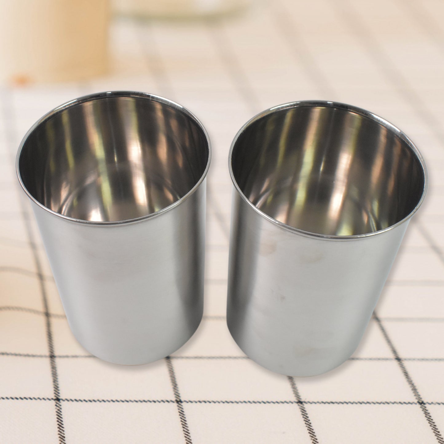 Two Wukusy stainless steel airtight containers with transparent lids, 1000ml capacity, ideal for kitchen storage and organization.