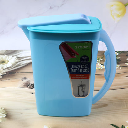 Wukusy Easy Cool Lemon water jug with lid and handle, 2200ml, clear plastic container for refreshing drinks and serving.